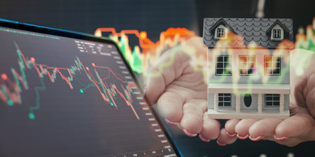 Dynamic Stock Market Analysis with Rising Graph and Blurred Trading Chartの写真素材