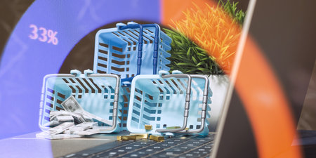 Small blue shopping baskets with cash and gold bars on a laptop keyboard, symbolizing e-commerce,...