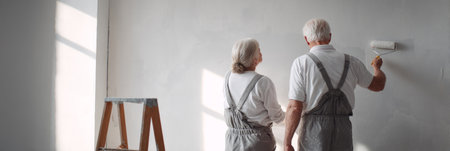 elderly couple painting over repaired walls together in their old home. Generative AIの素材