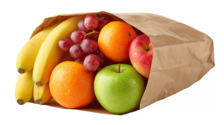 Eco-friendly paper bag filled with a colorful mix of fresh fruits including bananas, apples, oranges, grapes, and green apples.の素材