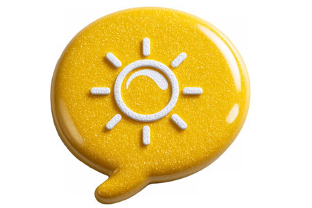3D glossy yellow speech bubble featuring a raised white sun symbol, representing daylight, weather, brightness, and sunny communication.の素材