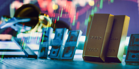2026 Financial Goals Concept With Gold Bars and Stacks of Cash on Desk, Stock Market Chart...