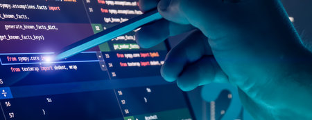 Close Up of Programmer Hand Using Stylus on Source Code Editor Screen in Futuristic Blue Tech