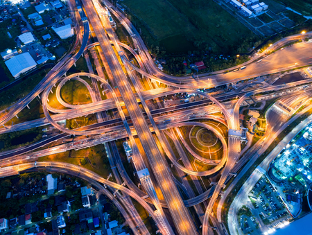 Bangkok Expressway top view, Top view over the highway,expressway and motorway at night, Aerial view interchange of a city, Shot from drone, Expressway is an important infrastructure in Thailandの写真素材