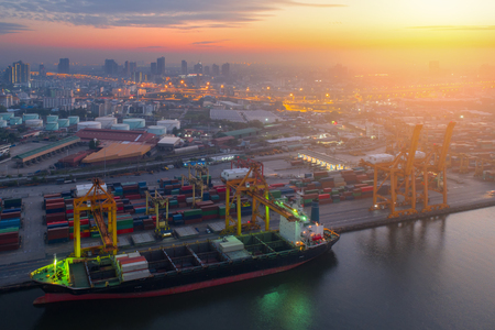 Containers yard in port congestion with ship vessels are loading and discharging operations of the transport in international port.のeditorial素材