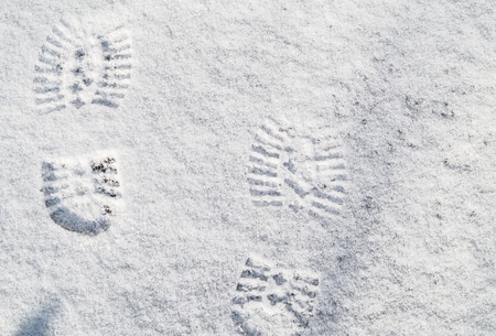 Footprints in the fresh snow close up