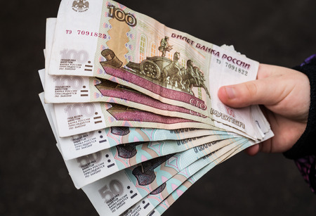 Russian money rubles in hand close up
