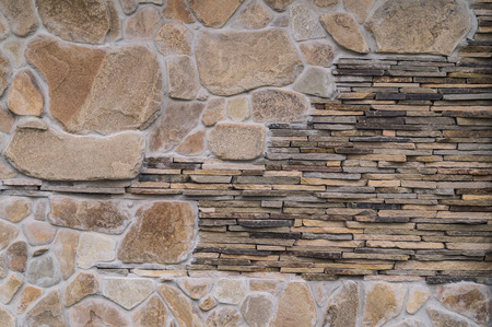Stone wall made of stone for a background