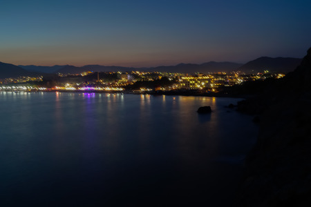 Night landscape of the Black Sea resort of lights on the waterfrontの写真素材