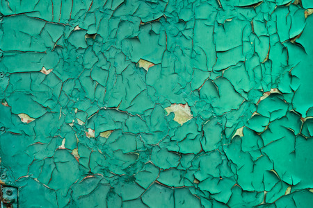 old wooden surface background with cracked paintの写真素材