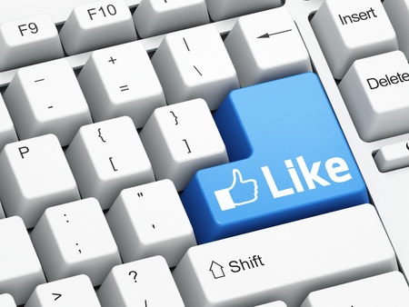 Keyboard with blue Like button, social network conceptの写真素材