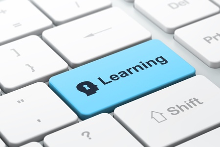 Education concept: computer keyboard with Head With Keyhole icon and word Learning, selected focus on enter button, 3d renderの写真素材