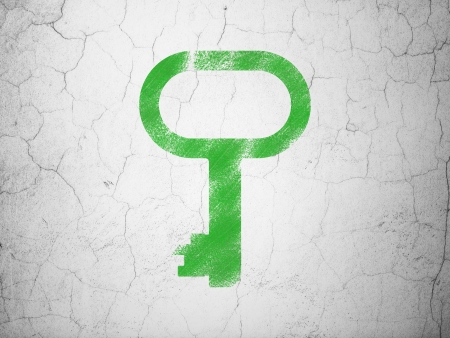 Privacy concept: Green Key on textured concrete wall background, 3d renderの写真素材
