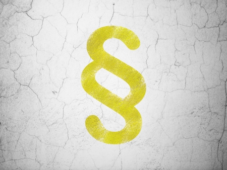 Law concept: Yellow Paragraph on textured concrete wall background, 3d renderの写真素材