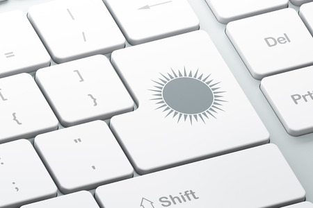 Vacation concept: Enter button with Sun on computer keyboard background, 3d renderの写真素材