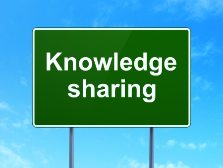 Education concept: Knowledge Sharing on green road (highway) sign, clear blue sky , 3d renderの写真素材