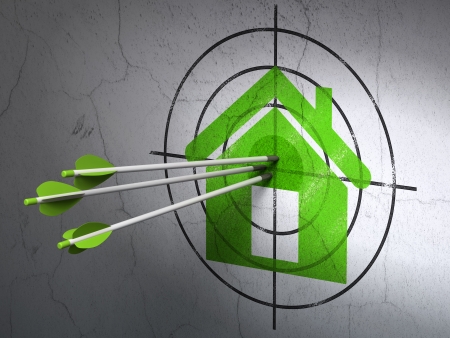 Success privacy concept: arrows hitting the center of Green Home target on wall , 3d renderの写真素材