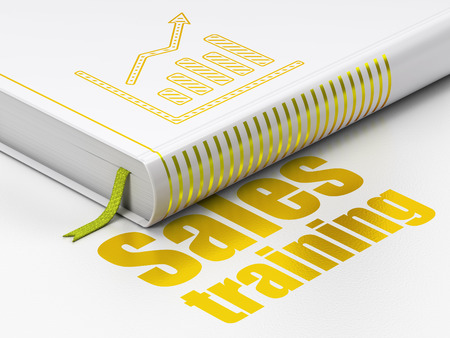 Marketing concept: closed book with Gold Growth Graph icon and text Sales Training on floor, white background, 3d renderの写真素材