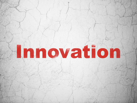 Business concept: Red Innovation on textured concrete wall background, 3d renderの写真素材
