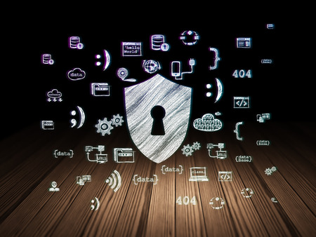 Safety concept: Glowing Shield With Keyhole icon in grunge dark room with Wooden Floor, black background with  Hand Drawn Programming Icons, 3d renderの写真素材