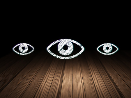 Protection concept: row of Glowing eye icons around eye icon in grunge dark room Wooden Floor, dark background, 3d renderの写真素材