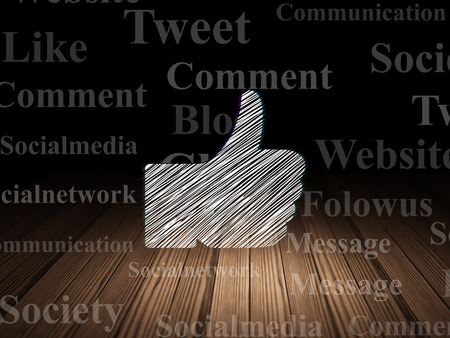 Social media concept: Glowing Thumb Up icon in grunge dark room with Wooden Floor, black background with  Tag Cloud, 3d renderの写真素材