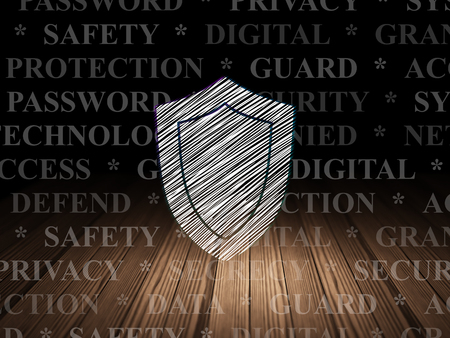 Privacy concept: Glowing Shield icon in grunge dark room with Wooden Floor, black background with  Tag Cloudの写真素材