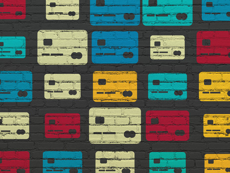 Business concept: Painted multicolor Credit Card icons on Black Brick wall backgroundの写真素材