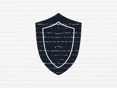 Protection concept: Painted black Shield icon on White Brick wall backgroundの写真素材