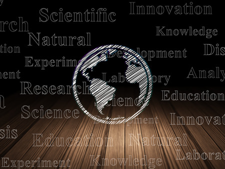 Science concept: Glowing Globe icon in grunge dark room with Wooden Floor, black background with  Tag Cloudの写真素材