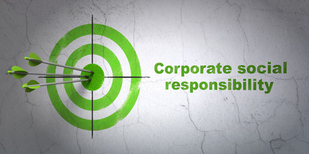 Success finance concept: arrows hitting the center of target, Green Corporate Social Responsibility on wall backgroundの写真素材
