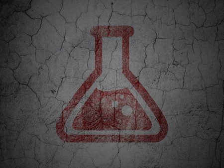 Science concept: Red Flask on grunge textured concrete wall backgroundの写真素材