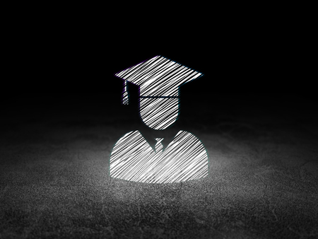 Science concept: Glowing Student icon in grunge dark room with Dirty Floor, black backgroundの写真素材