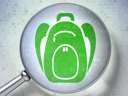 Studying concept: magnifying optical glass with Backpack icon on digital backgroundの写真素材