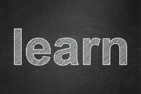 Education concept: text Learn on Black chalkboard background