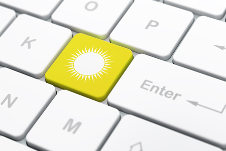 Tourism concept: computer keyboard with Sun icon on enter button background, selected focus, 3d renderの写真素材