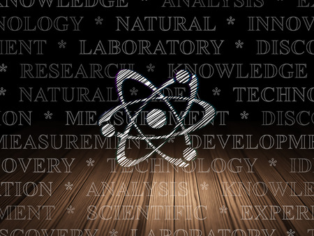 Science concept: Glowing Molecule icon in grunge dark room with Wooden Floor, black background with  Tag Cloudの写真素材