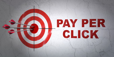 Success advertising concept: arrows hitting the center of target, Red Pay Per Click on wall background, 3D renderingの写真素材
