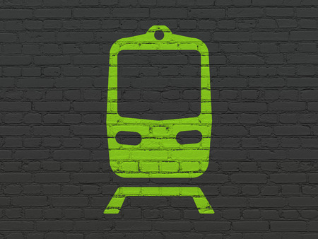 Tourism concept: Painted green Train icon on Black Brick wall backgroundの写真素材