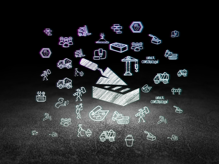 Constructing concept: Glowing Brick Wall icon in grunge dark room with Dirty Floor, black background with  Hand Drawn Construction Iconsの写真素材