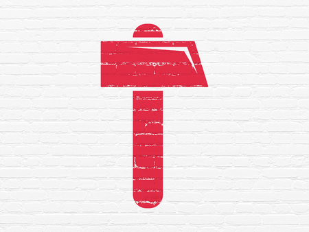 Building construction concept: Painted red Hammer icon on White Brick wall backgroundの写真素材