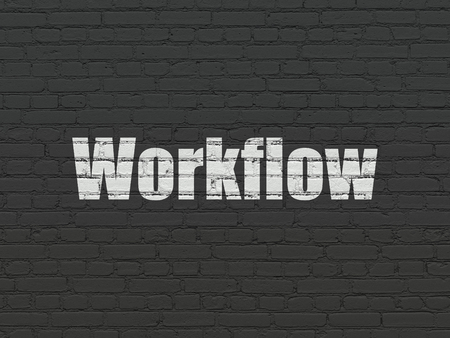 Finance concept: Painted white text Workflow on Black Brick wall backgroundの写真素材