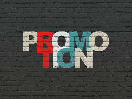 Marketing concept: Painted multicolor text Promotion on Black Brick wall backgroundの写真素材