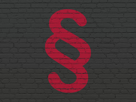 Law concept: Painted red Paragraph icon on Black Brick wall backgroundの写真素材