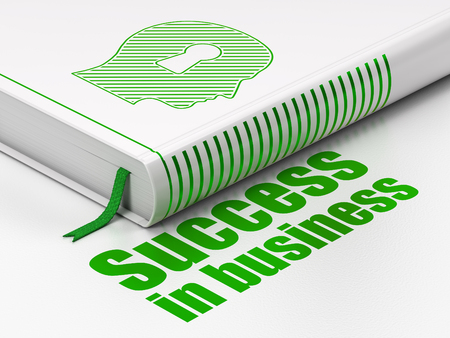 Business concept: closed book with Green Head With Keyhole icon and text Success In business on floor, white background, 3D renderingの写真素材
