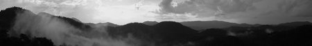 Mountain panorama. landscape with the dramatic sky view. black and white background