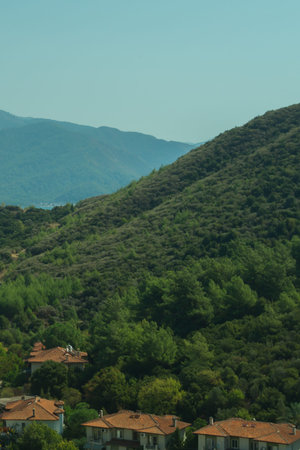 Mountain town panoramic view. landscape with a city between the hills