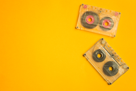 Retro cassette tape on the yellow background. copy spaceの写真素材