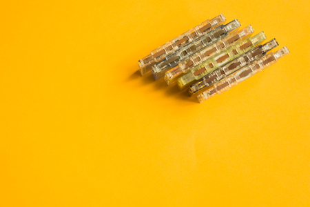 Retro cassette tape on the yellow background. copy spaceの写真素材