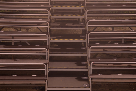 Empty benches on tribune with scene backgroundの写真素材